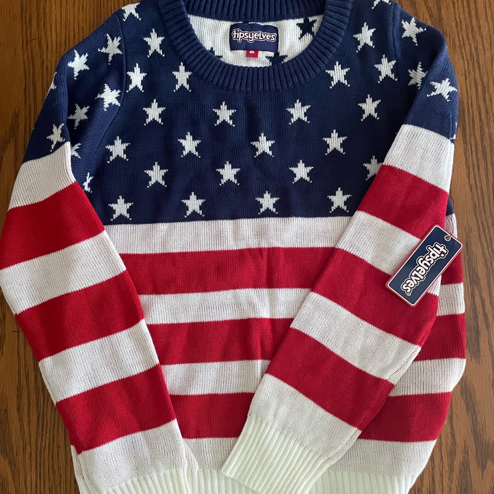 New with tags Tipsy Elves patriotic flag sweater. Perfect for 4th of July!